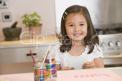 Young Girl Drawing Pictures
