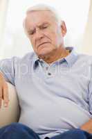 Senior Man Sitting On Couch