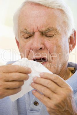 Senior Man Sneezing