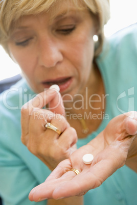 Woman Taking Pills