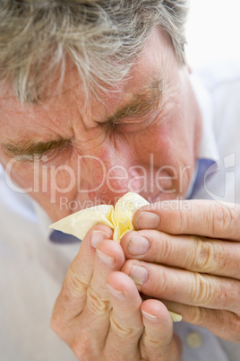 Man Blowing His Nose