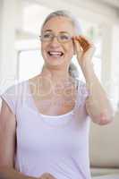 Woman Looking Through New Glasses