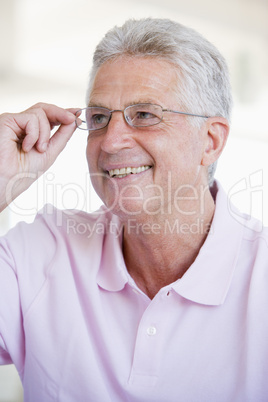 Man Looking Through New Glasses