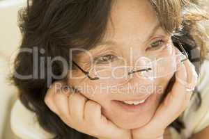 Woman Looking Through New Glasses