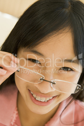 Girl Looking Through New Glasses