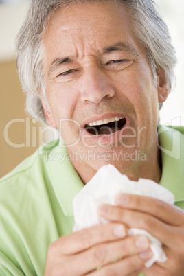 Man Blowing His Nose