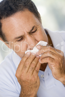 Man Blowing His Nose