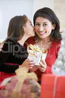 Girl Surprising Her Mother With Christmas Gift