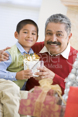 Boy Surprising Father With Christmas Present