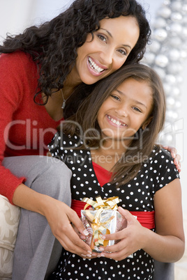 Mother Giving Daughter Her Christmas Present