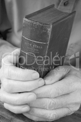 Older Man Holding Bible