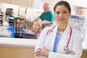 Doctors And Nurses At The Reception Area Of A Hospital