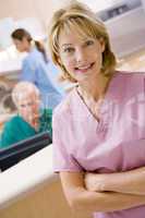 Nurses In The Reception Area Of A Hospital