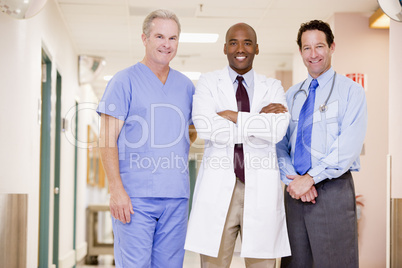 Doctors Standing In A Hospital Corridor