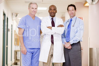 Doctors Standing In A Hospital Corridor