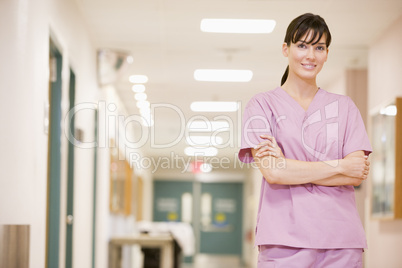 Nurse Standing In A Hospital Corridor