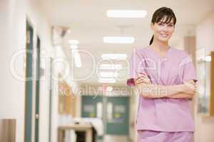 Nurse Standing In A Hospital Corridor