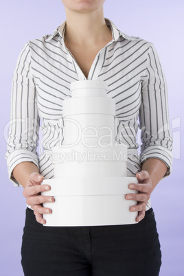 Woman With Round Boxes