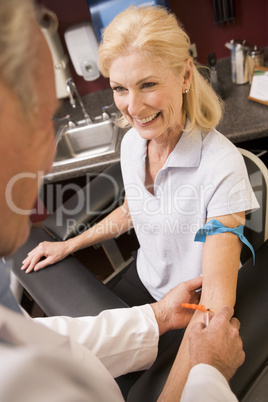 Middle Aged Woman Having Blood Test Done