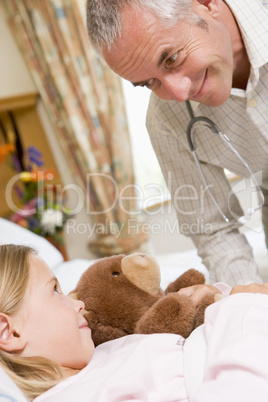 Doctor Talking To His Young Patient