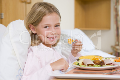 Young Girl Eating Hospital Food