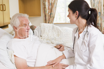Doctor Talking With Senior Man