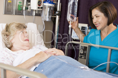 Doctor Checking Up On Senior Woman
