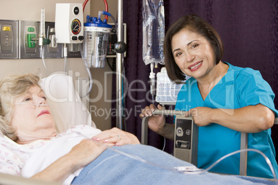 Doctor Checking Up On Senior Woman Patient