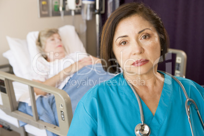 Doctor Looking Serious In Patients Room
