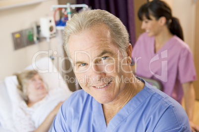 Doctor Checking Up On Patient In Hospital