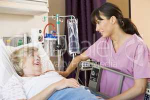 Nurse Talking To Senior Woman