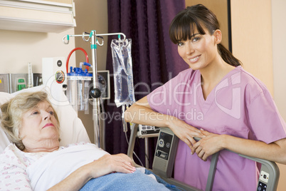 Nurse Checking Up On Patient