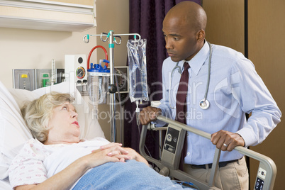 Doctor Checking Up On Patient In Hospital