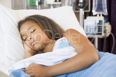 Young Girl Sleeping In Hospital Bed