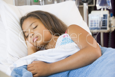 Young Girl Sleeping In Hospital Bed