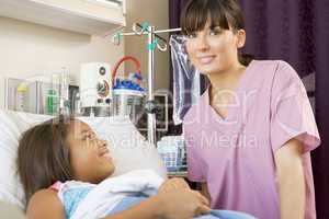 Nurse Checking Up On Young Patient