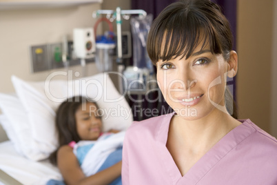 Nurse Standing In Hospital Room
