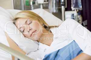 Woman Asleep In Hospital Bed