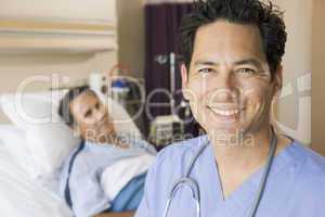 Doctor Smiling In Patients Room