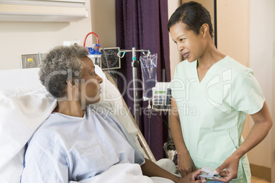 Nurse Talking To Senior Woman