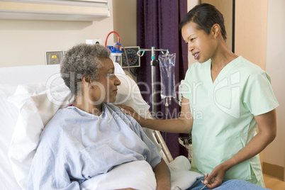 Nurse Talking To Senior Woman