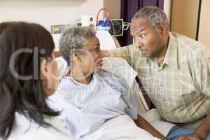 Doctor Explaining,Senior Couple Looking At Each Other