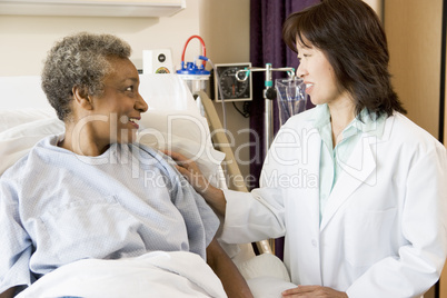 Doctor Talking To Senior Woman