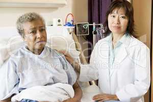 Doctor Talking To Senior Woman