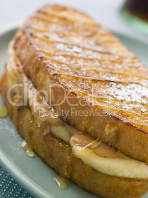 Peanut Butter And Banana Eggy Bread Sandwich With Syrup