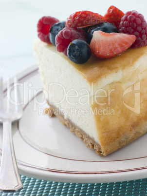 Slice Of New York Cheesecake On A Plate