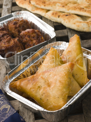 Indian Take Away- Vegetable Samosa, Naan Bread And Onion Bahji
