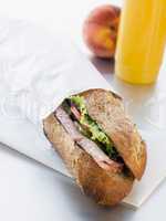 Ham And Salad Granary Baguette With Mango And Banana Smoothie An