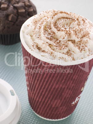 Cup Of Hot Chocolate With A Double Chocolate Muffin