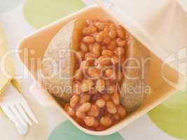 Baked Potato With Baked Beans And Cheese In A Take Away Box
